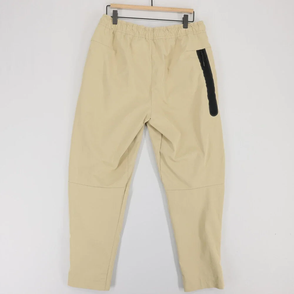 Nike Sportswear Tech Woven Pants Mens L Beige Drawstring Tapered Joggers